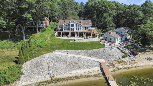 481 Seminole Rd, Norton Shores, MI 49444 - view of subject property featuring a nearby body of water and a forest