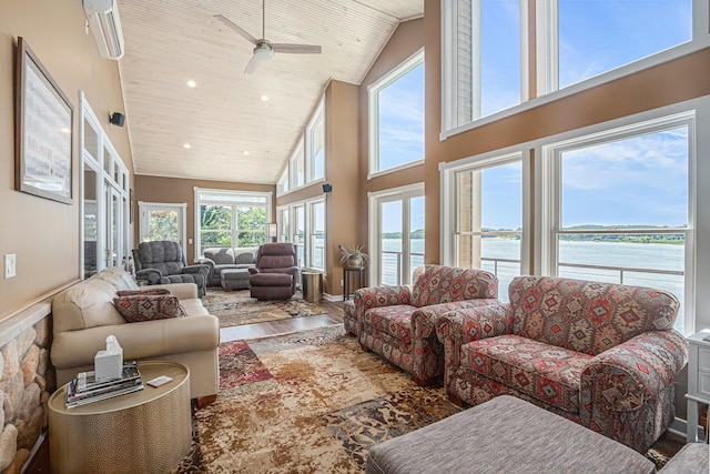 481 Seminole Rd, Norton Shores, MI 49444 - living room with a water view, wood finished floors, high vaulted ceiling, ceiling fan, and recessed lighting