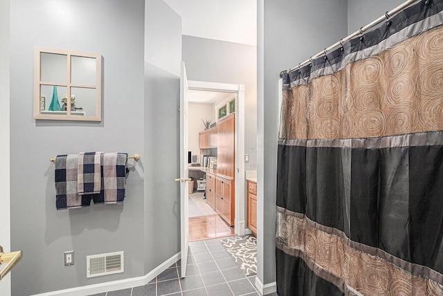 481 Seminole Rd, Norton Shores, MI 49444 - full bath with tile patterned flooring and vanity