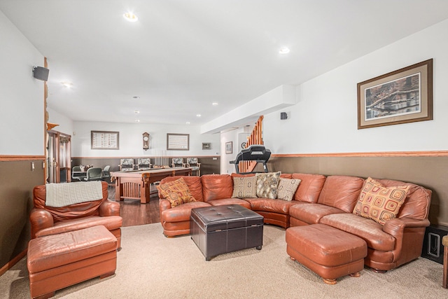 481 Seminole Rd, Norton Shores, MI 49444 - carpeted living room featuring recessed lighting, bar, and wood finished floors