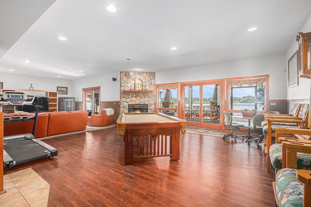481 Seminole Rd, Norton Shores, MI 49444 - living area with a fireplace, wood finished floors, recessed lighting, and pool table