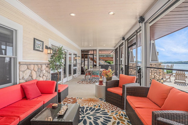 481 Seminole Rd, Norton Shores, MI 49444 - sunroom / solarium featuring an outdoor living space and a water view