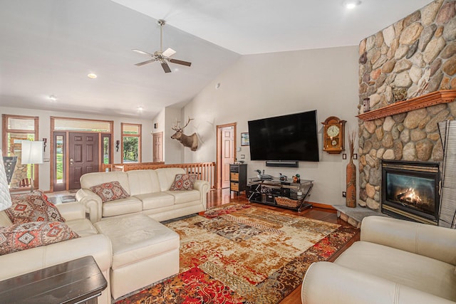 481 Seminole Rd, Norton Shores, MI 49444 - living area featuring ceiling fan, vaulted ceiling, wood finished floors, and a fireplace