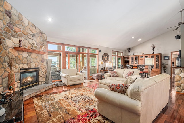 481 Seminole Rd, Norton Shores, MI 49444 - living area with dark wood-style flooring, a stone fireplace, a ceiling fan, high vaulted ceiling, and recessed lighting