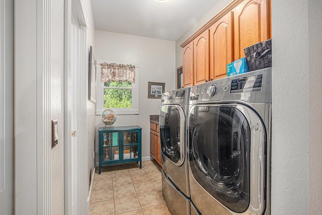 481 Seminole Rd, Norton Shores, MI 49444 - washroom with washer and dryer and cabinet space