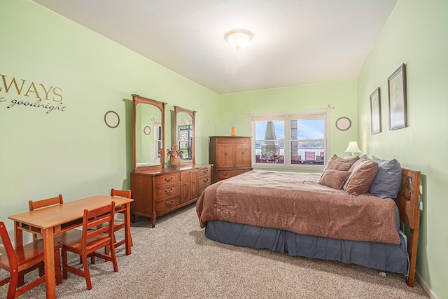 481 Seminole Rd, Norton Shores, MI 49444 - bedroom featuring light carpet