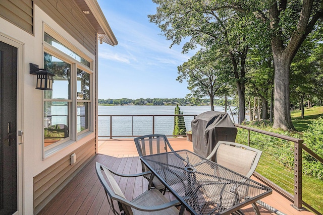 481 Seminole Rd, Norton Shores, MI 49444 - wooden terrace featuring a water view, outdoor dining area, and a grill