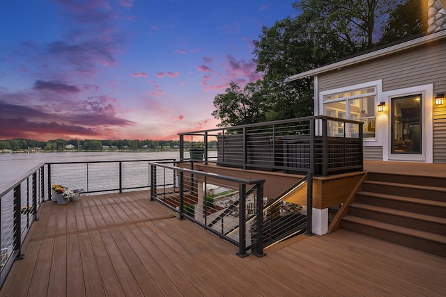 481 Seminole Rd, Norton Shores, MI 49444 - wooden terrace with a water view