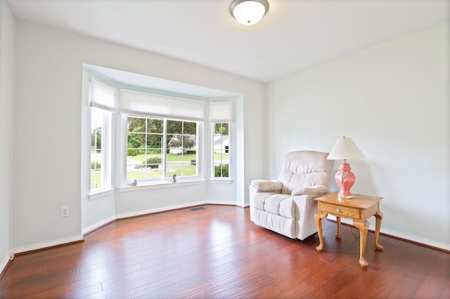 11315 Grand Oaks Dr, Clio, MI 48420 - sitting room with wood finished floors