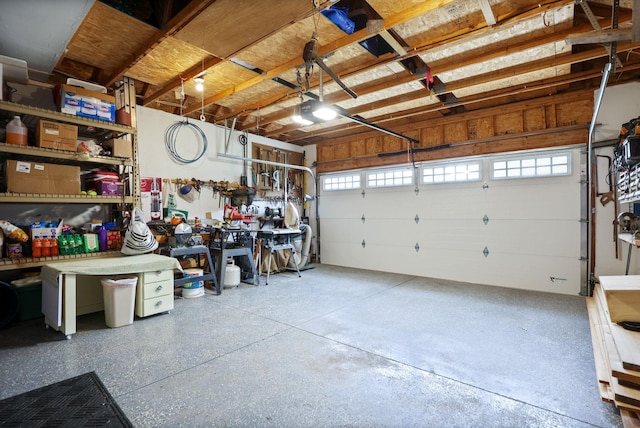 11315 Grand Oaks Dr, Clio, MI 48420 - garage featuring a garage door opener