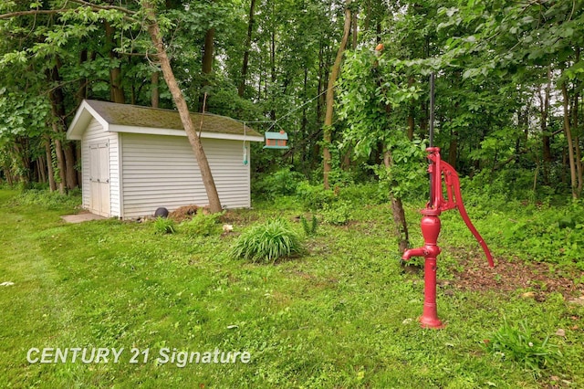 11315 Grand Oaks Dr, Clio, MI 48420 - view of yard featuring a storage unit