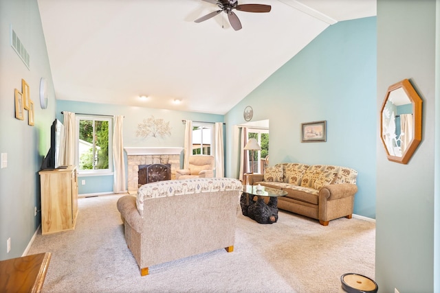 11315 Grand Oaks Dr, Clio, MI 48420 - carpeted living room with plenty of natural light, ceiling fan, a fireplace, and high vaulted ceiling