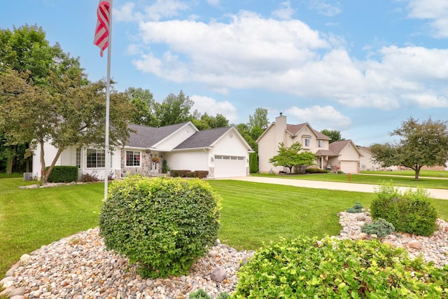 11315 Grand Oaks Dr, Clio, MI 48420 - view of front facade with a garage, concrete driveway, and a front lawn