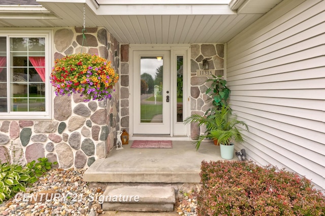 11315 Grand Oaks Dr, Clio, MI 48420 - property entrance featuring stone siding