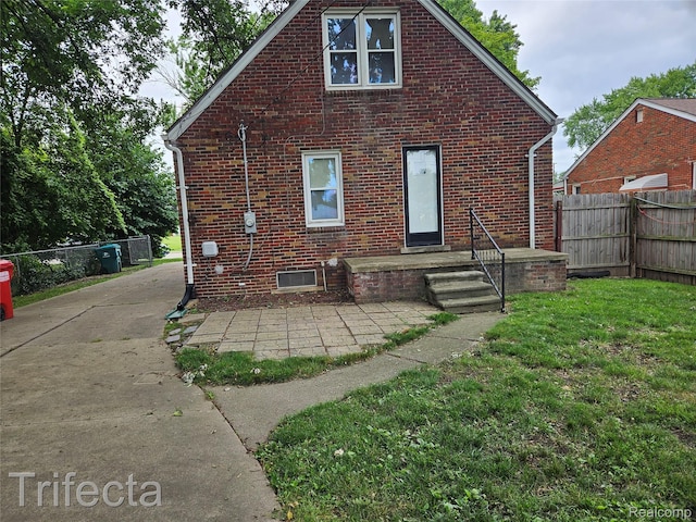16684 Forest Ave, Harrison Township, MI 48021 - rear view of property featuring brick siding