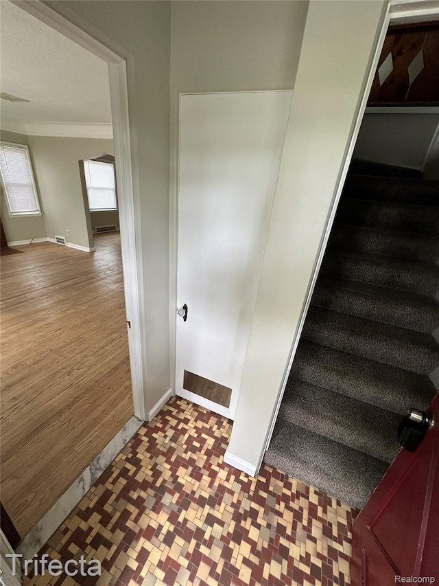 16684 Forest Ave, Harrison Township, MI 48021 - staircase featuring wood finished floors and ornamental molding