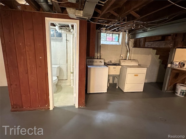 16684 Forest Ave, Harrison Township, MI 48021 - below grade area with washer and clothes dryer and a sink