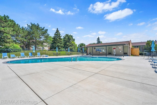 17979 University Park Dr, Livonia, MI 48152 - community pool featuring a patio