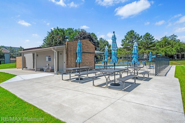 17979 University Park Dr, Livonia, MI 48152 - view of community with a patio area