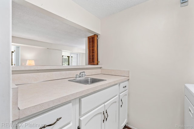 17979 University Park Dr, Livonia, MI 48152 - bathroom featuring a textured ceiling and vanity