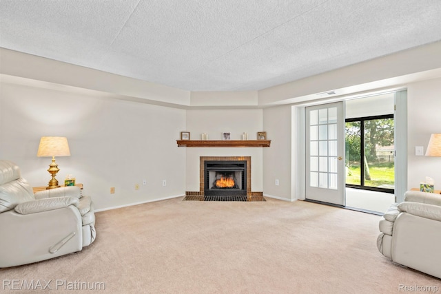 17979 University Park Dr, Livonia, MI 48152 - carpeted living room with a textured ceiling and a fireplace