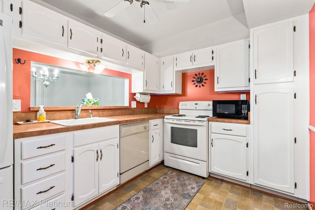 17979 University Park Dr, Livonia, MI 48152 - kitchen with white appliances, white cabinetry, and a ceiling fan
