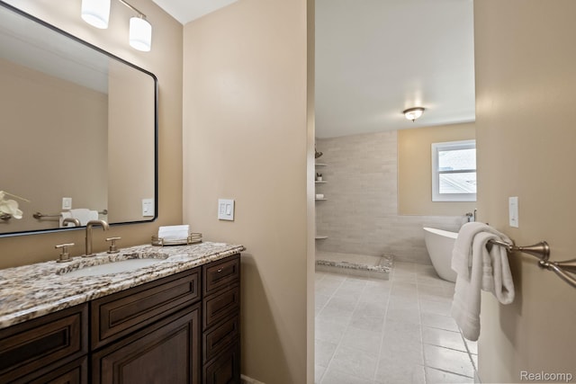1257 Lake Shore Blvd, Lake Orion, MI 48362 - bathroom with vanity, a freestanding tub, tile patterned floors, and a tile shower