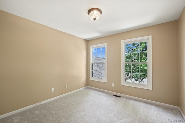 1257 Lake Shore Blvd, Lake Orion, MI 48362 - spare room with baseboards and carpet