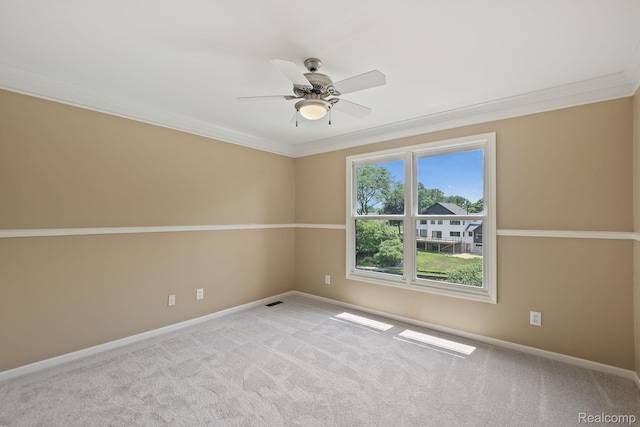 1257 Lake Shore Blvd, Lake Orion, MI 48362 - empty room featuring crown molding, ceiling fan, and carpet floors