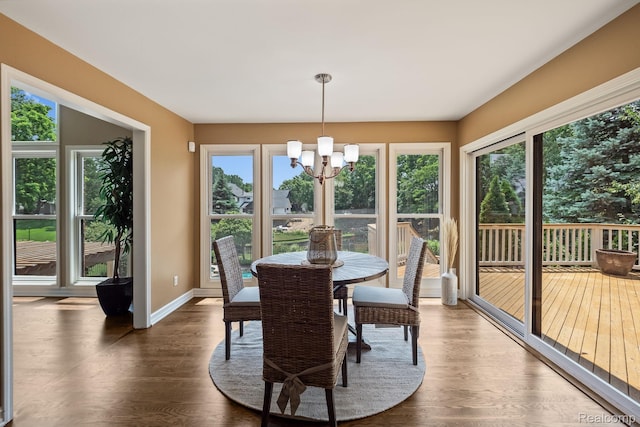 1257 Lake Shore Blvd, Lake Orion, MI 48362 - dining room with a chandelier and wood finished floors