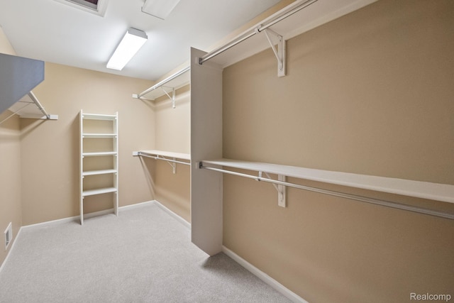 1257 Lake Shore Blvd, Lake Orion, MI 48362 - walk in closet featuring carpet