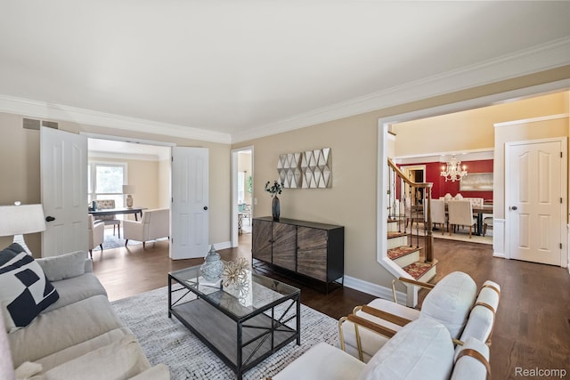 1257 Lake Shore Blvd, Lake Orion, MI 48362 - living room featuring a chandelier, crown molding, wood finished floors, and stairs