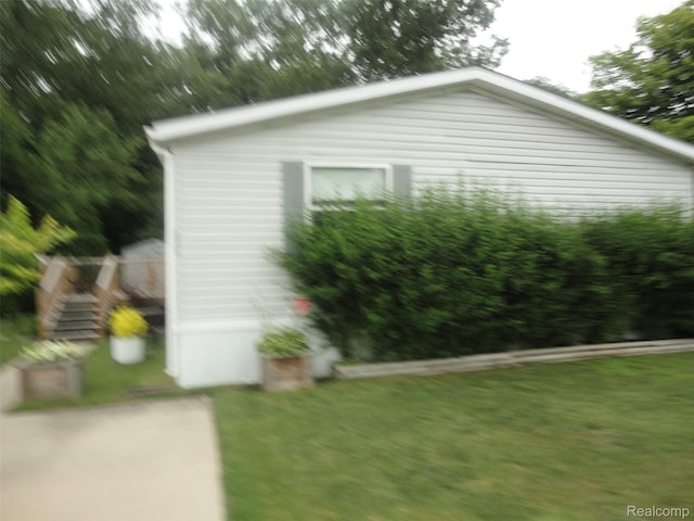 5933 Vernon, Belleville, MI 48111 - view of property exterior featuring stairs