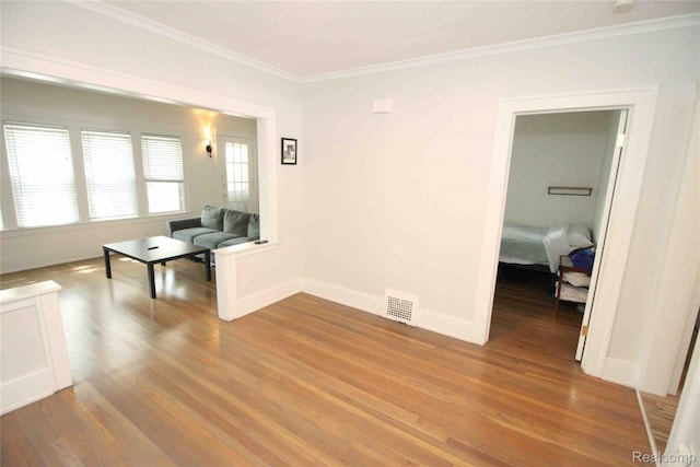 1324-1322 Wayburn St, Grosse Pointe, MI 48230 - living room with crown molding, wood finished floors, and plenty of natural light