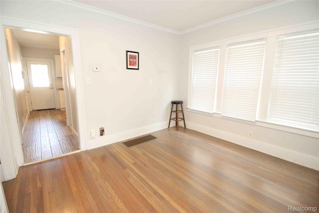 1324-1322 Wayburn St, Grosse Pointe, MI 48230 - spare room with wood-type flooring and crown molding