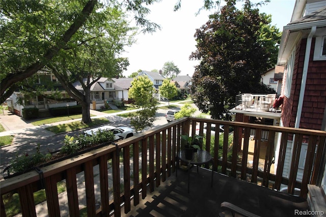 1324-1322 Wayburn St, Grosse Pointe, MI 48230 - wooden porch featuring a residential view