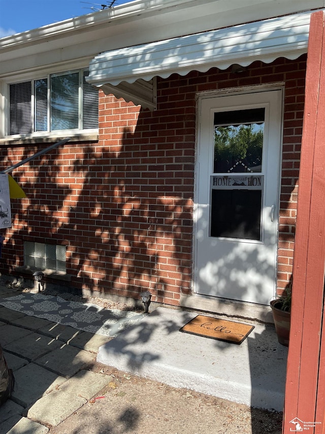 1503 Philomene Blvd, Lincoln Park, MI 48146 - view of exterior entry featuring brick siding