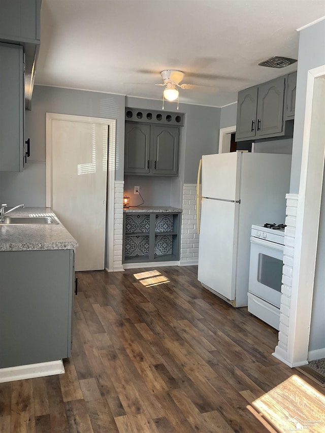 1503 Philomene Blvd, Lincoln Park, MI 48146 - kitchen featuring gray cabinets, white range with gas stovetop, ceiling fan, and dark wood-type flooring