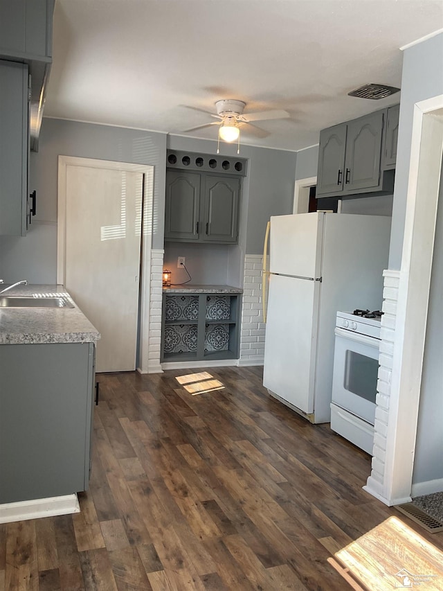 1503 Philomene Blvd, Lincoln Park, MI 48146 - kitchen with white appliances, gray cabinets, a ceiling fan, dark wood-type flooring, and light countertops