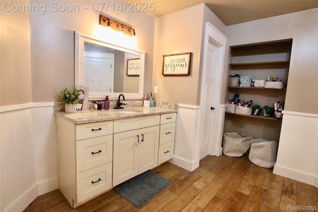4385 Nelson Scott Dr, Holly, MI 48442 - bathroom featuring wood finished floors and vanity