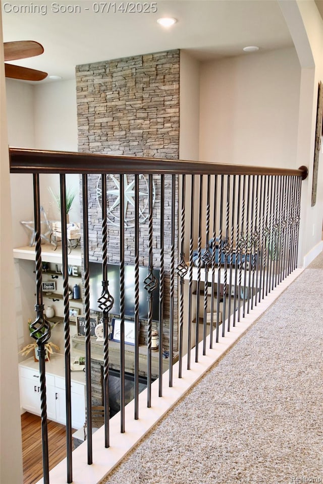 4385 Nelson Scott Dr, Holly, MI 48442 - hall with arched walkways and wood finished floors