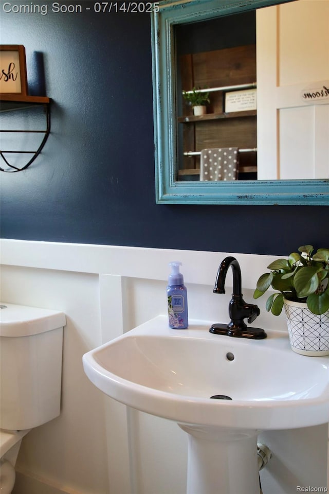 4385 Nelson Scott Dr, Holly, MI 48442 - half bath with a sink and toilet