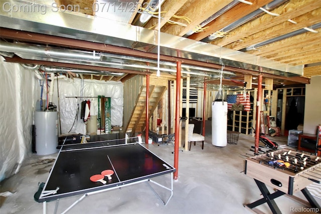 4385 Nelson Scott Dr, Holly, MI 48442 - unfinished basement with water heater and stairway