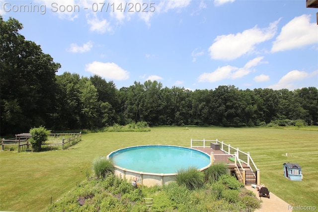 4385 Nelson Scott Dr, Holly, MI 48442 - outdoor pool featuring a yard and a forest view
