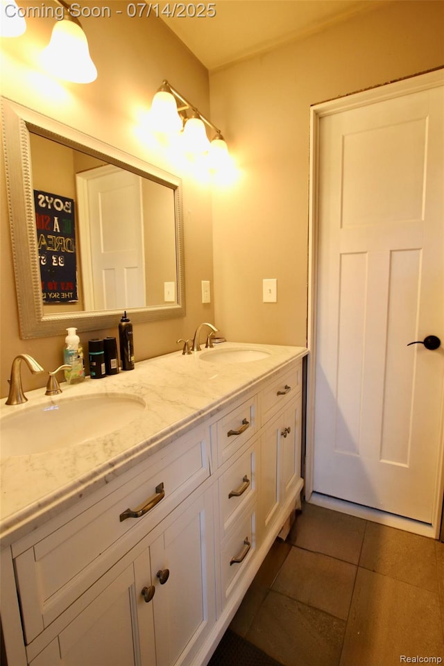 4385 Nelson Scott Dr, Holly, MI 48442 - bathroom featuring double vanity and tile patterned flooring