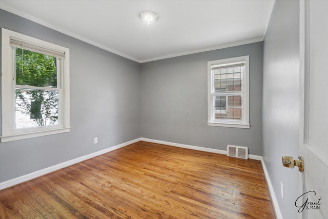 19007 Kentfield St, Detroit, MI 48219 - empty room featuring wood finished floors and ornamental molding