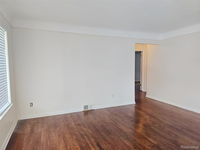 11245 Mae Ave, Warren, MI 48089 - unfurnished room with dark wood-style floors and baseboards