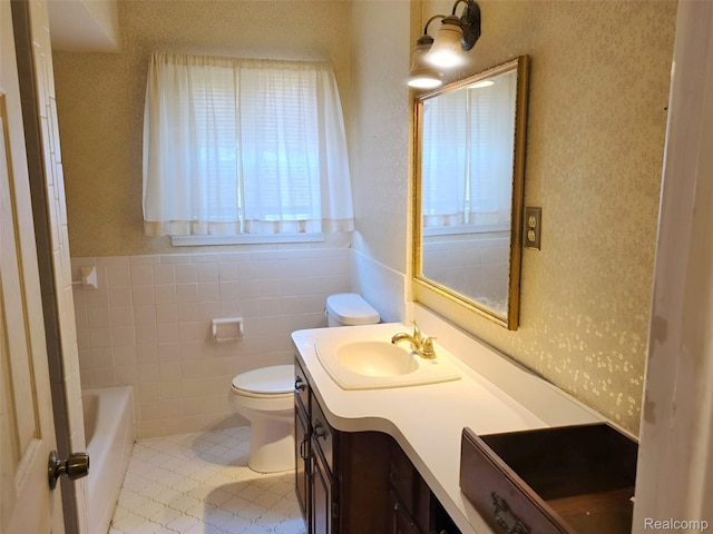 11245 Mae Ave, Warren, MI 48089 - bathroom with vanity, a bath, tile patterned floors, tile walls, and wallpapered walls