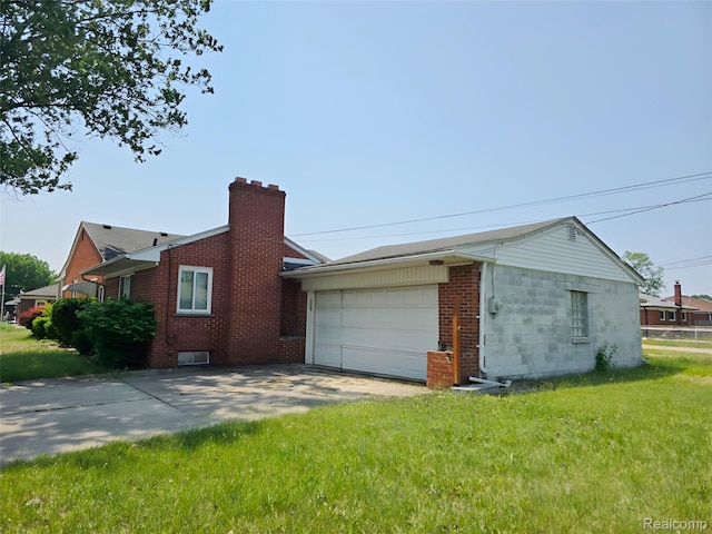 11245 Mae Ave, Warren, MI 48089 - view of home's exterior with concrete driveway, a garage, a chimney, a yard, and brick siding