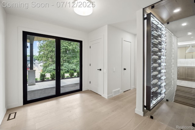 3539 Walbri Dr, Bloomfield Hills, MI 48304 - wine area featuring light wood-style floors and recessed lighting